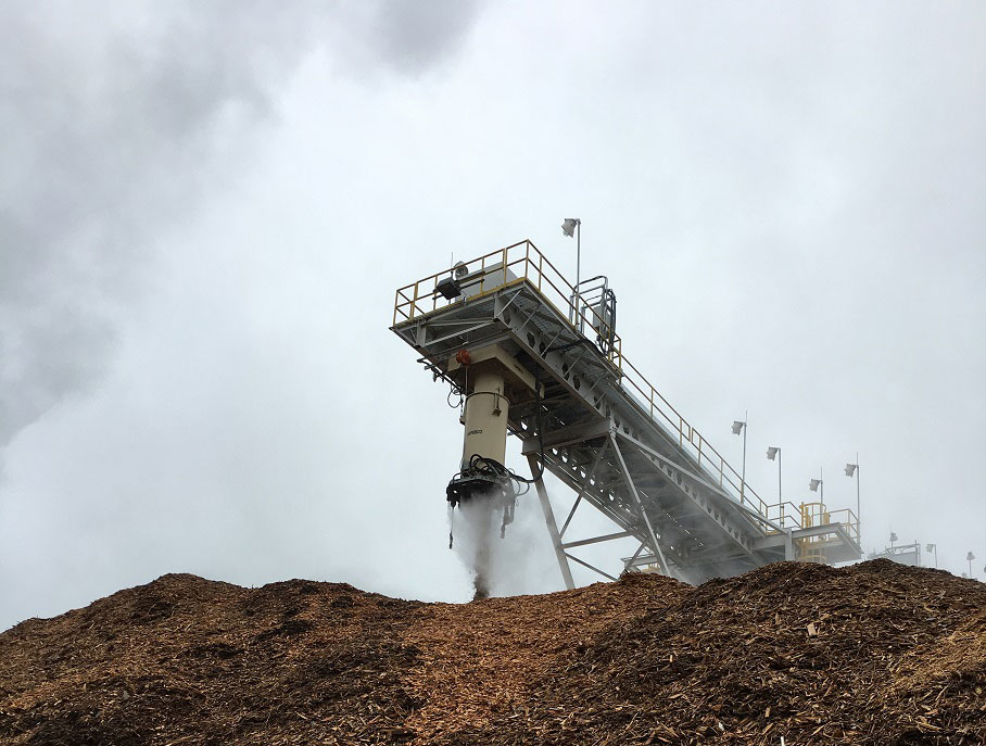 Dust suppression on stacker at biomass and recycling operation