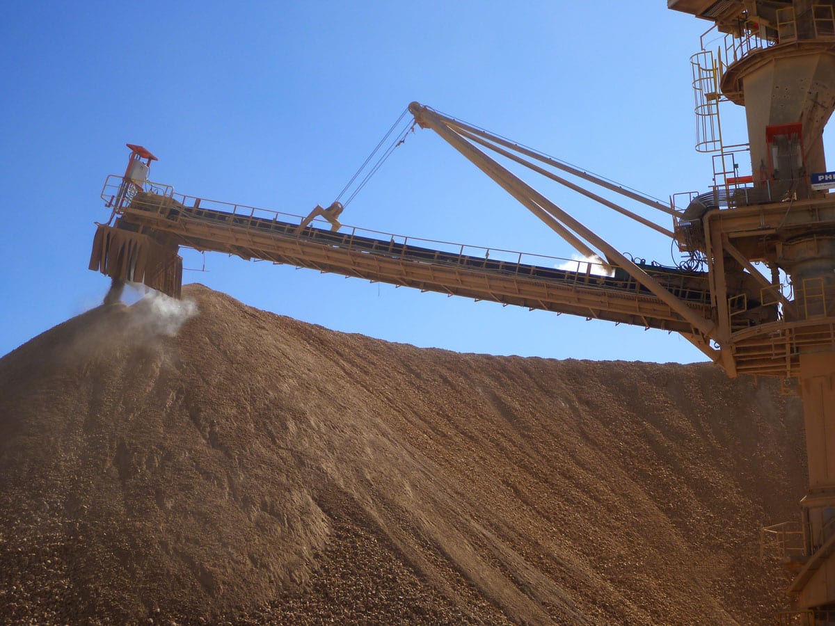 Dust suppression dry fog system installed on storage piles