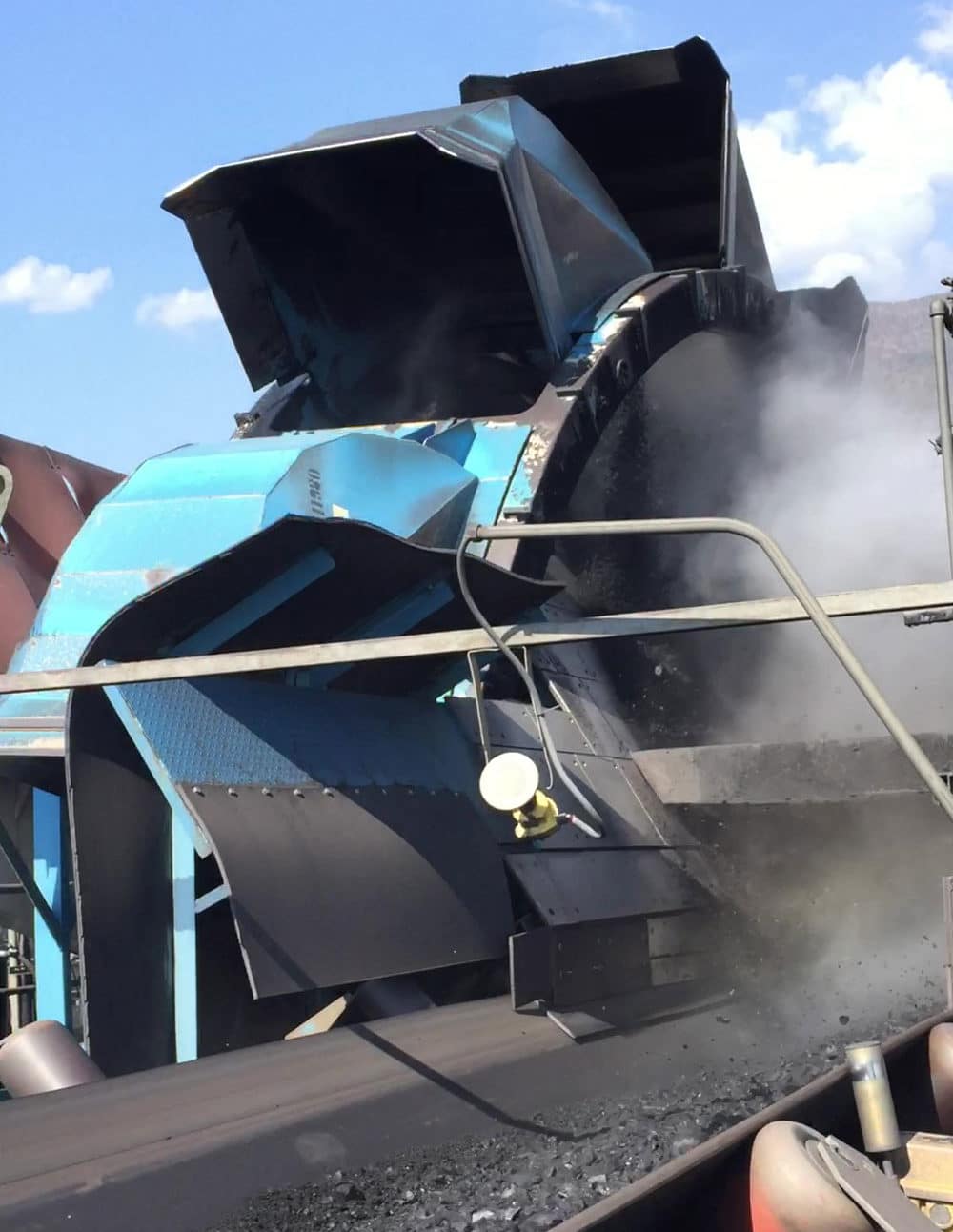 Dust suppression on reclaimer at mining and minerals operation