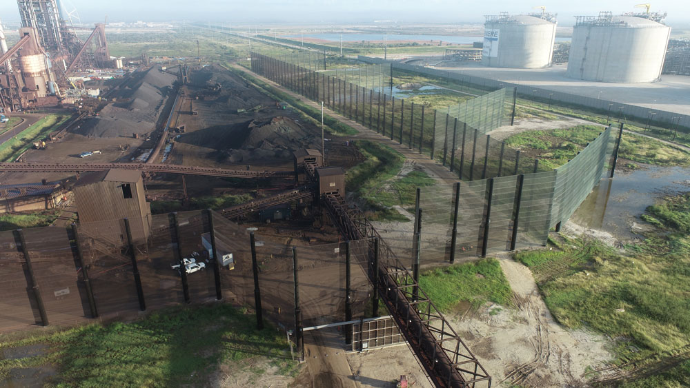 Dust suppression on storage piles at marine and rail terminal