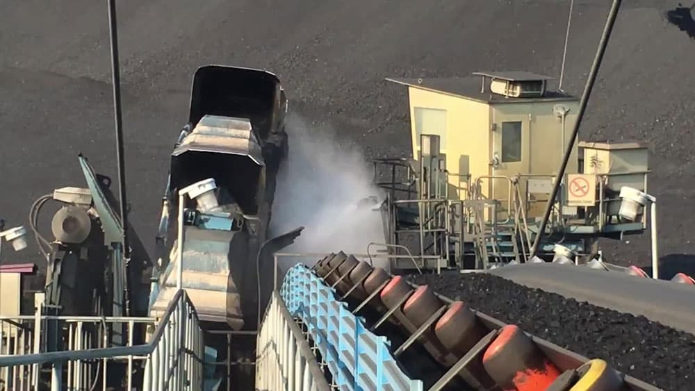 Dust suppression on reclaimer at power generation terminal