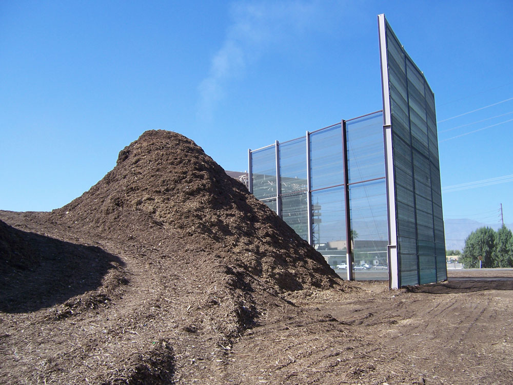 Dust suppression on storage piles at biomass and recycling operation
