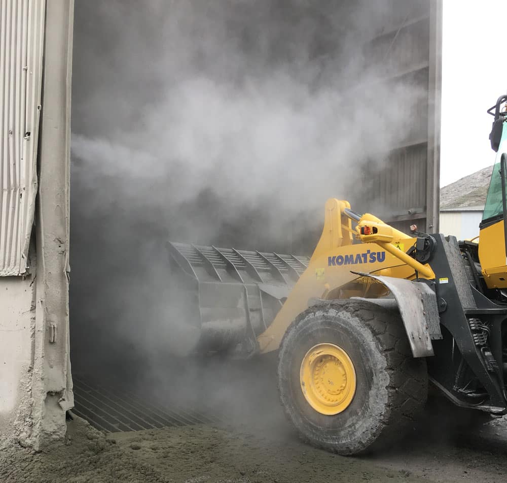 Dust suppression on truck dump at aggregate, cement and sand operation