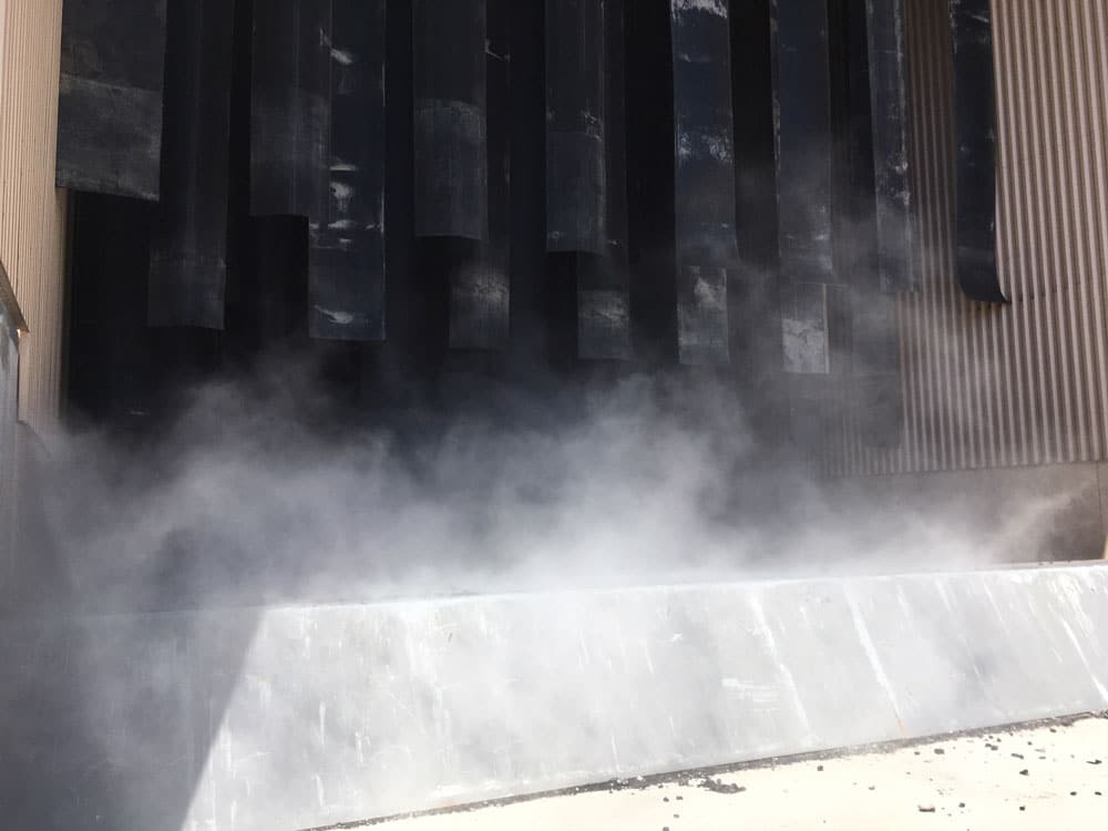 Dust suppression on truck dump at power generation operation